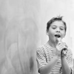 boy-singing-in-class-BW-small